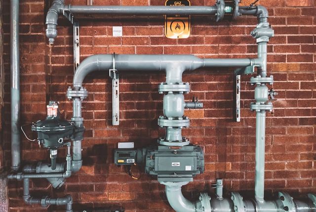 Whole-house water filtration system installed in a Fresno home